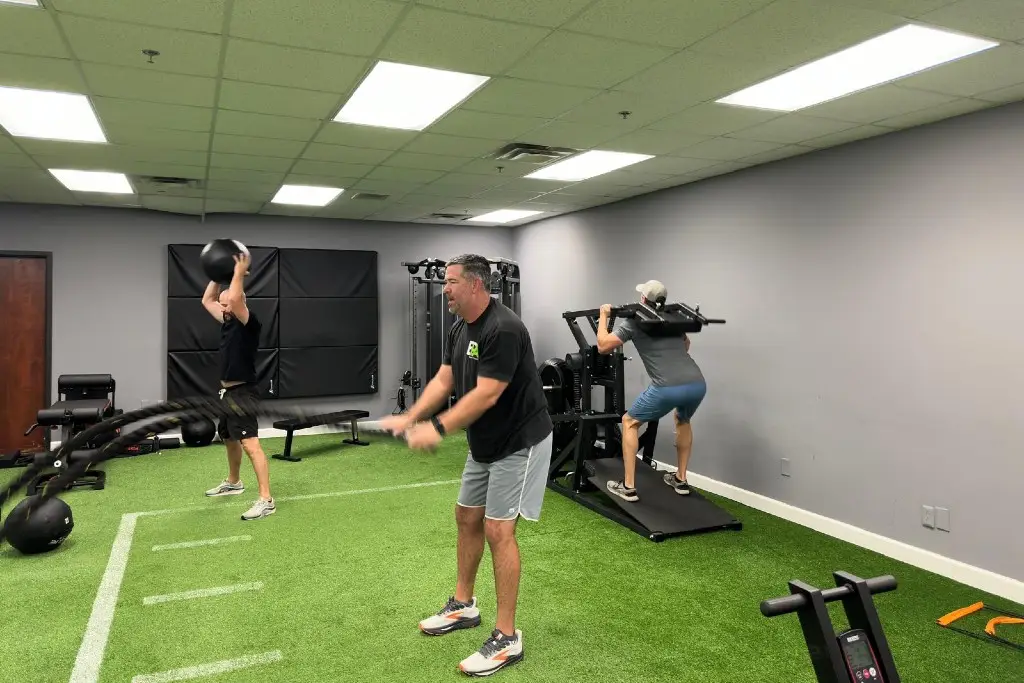 image of a group of men doing strength training in a local gym