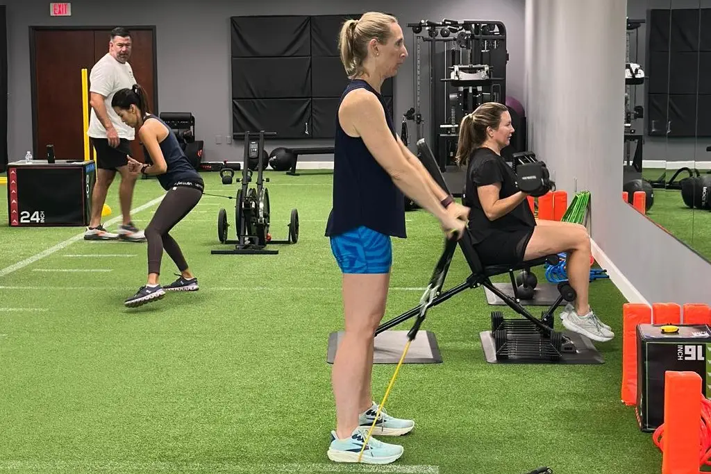 image of women's strength training class showing women training in a gym